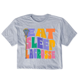 Gray t-shirt with colorful 'Eat Sleep Lacrosse' text and lacrosse stick graphic on a white background
