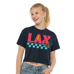 Young girl wearing a navy blue t-shirt with 'LAX' and sports graphics on a white background
