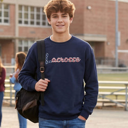 Young man wearing a navy sweatshirt with 'Lacrosse' printed on it, standing outdoors.