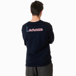 Person wearing a navy sweatshirt with lacrosse text on the back.