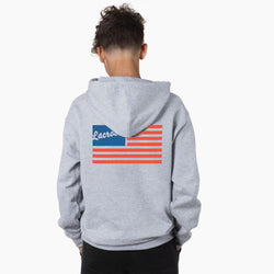Person wearing a gray hoodie with a lacrosse usa graphic on the back against a white background
