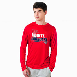 Person wearing a red 'Life Liberty Lacrosse' shirt on a white background