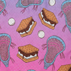 A close-up of a pink patterned fabric featuring s'mores and lacrosse sticks.