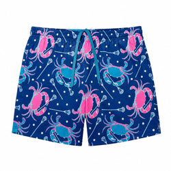 A pair of shorts featuring a vibrant blue background with a pattern of pink and light blue crabs holding lacrosse sticks, accented by white lacrosse balls and a teal drawstring waist.