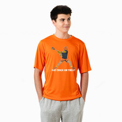 A young man wearing a bright orange t-shirt with a 'HAT TRICK OR TREAT' pumpkin graphic, paired with gray sweatpants, against a plain white background.