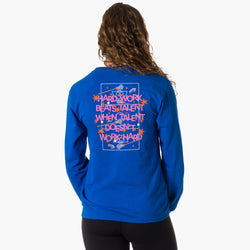 A woman viewed from the back wearing a bright blue long-sleeve sweatshirt with a large graphic print on the back. The print features the phrase 'HARD WORK BEATS TALENT WHEN TALENT DOESN'T WORK HARD' in pink and white lettering, surrounded by small orange stars and lacrosse illustration, paired with black leggings against a plain white background.
