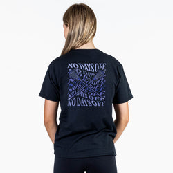 A woman viewed from the back wearing a black tee with a colorful graphic on the back that reads 'No Days Off' in purple and blue lettering, paired with black leggings, against a plain white background.