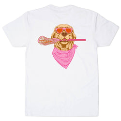 A white short-sleeve t-shirt with a graphic print of a golden retriever dog wearing pink sunglasses and a pink bandana, holding a pink lacrosse stick.