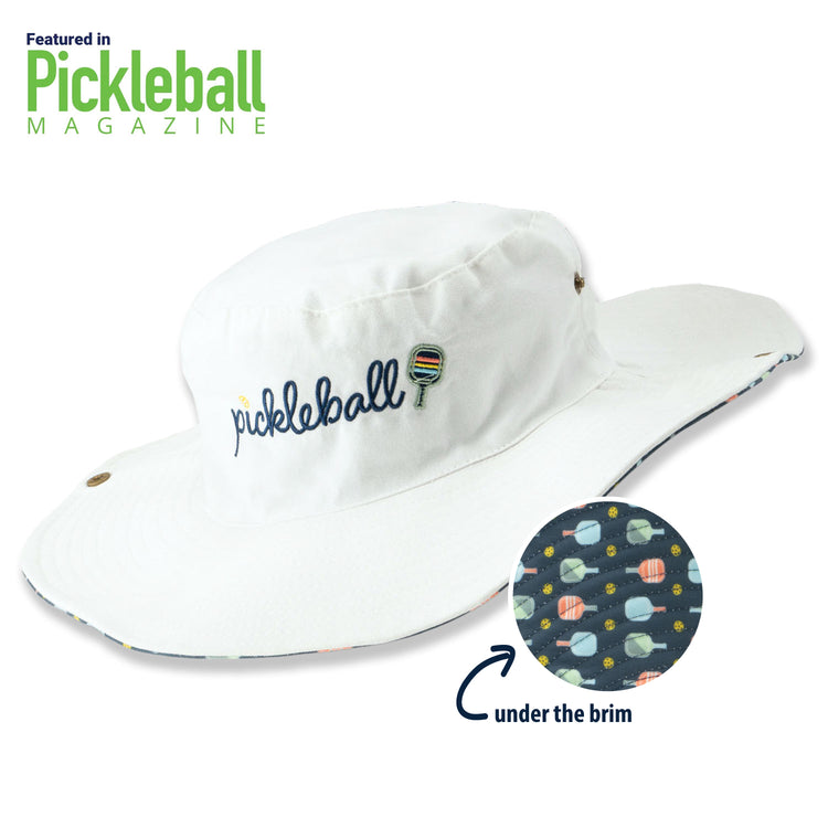 White bucket hat with 'pickleball' text and patterned fabric under the brim, featuring Pickleball Magazine logo.