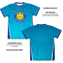 Blue pickleball shirt with yellow and blue logo on a white background