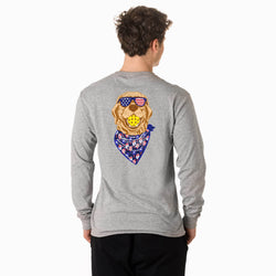 Person wearing a gray long-sleeve shirt with a colorful pickleball dog graphic on the back.