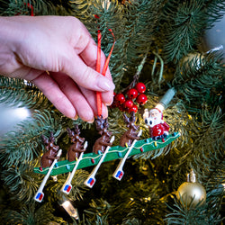 Rowing Reindeer Resin Ornament