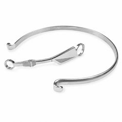 A polished silver-toned metal cuff bracelet with a geometric center detail, displayed on a clean white background.