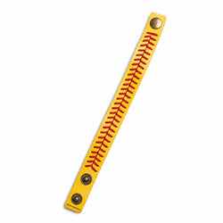 A yellow leather wristband designed to look like a softball seam, featuring red stitched details and brass snap buttons on both ends.