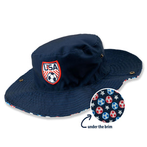 Navy blue bucket hat with USA soccer emblem and patterned interior on a white background