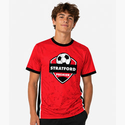 Person wearing a red custom soccer tee with 'Stratford Premier' logo on a white background
