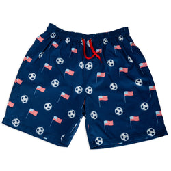 Navy swim shorts with soccer ball and flag pattern on a white background
