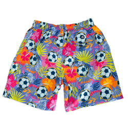 Colorful shorts with soccer ball and floral pattern on a white background