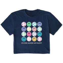 Navy blue t-shirt with colorful smiley face and soccer ball designs on a white background