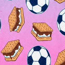 A repeating pattern featuring illustrated graham cracker s'mores and soccer balls on a pink background.