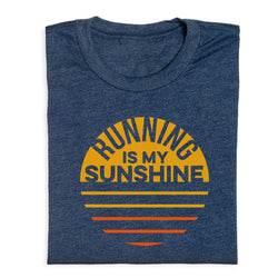 Folded blue t-shirt with 'Running is my Sunshine' text design on a white background