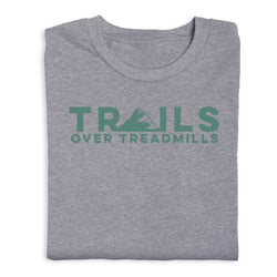 Gray t-shirt with 'TRAILS OVER TREADMILLS' text in green on a white background