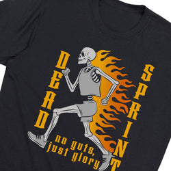 A close-up of a black t-shirt featuring a graphic of a running skeleton with gray shorts, yellow text reading 'DEAD SPRINT' and 'no guts, just glory', and orange and yellow flames.