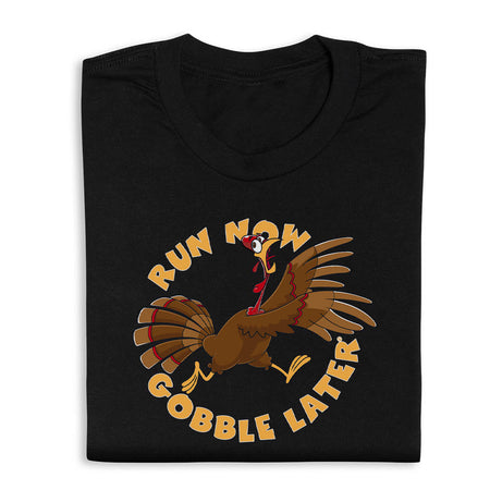 Black t-shirt with a turkey graphic and text 'Run now, gobble later' on a white background