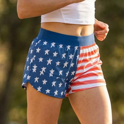 Person wearing shorts with star and stripe pattern outdoors