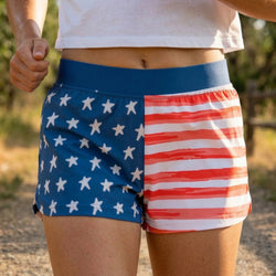 Person wearing shorts with American flag design outdoors