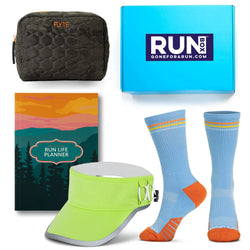 Collection of running gear including a visor, socks, and planner with RunBox branding.
