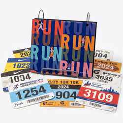 Run pattern bibfolio surrounded by assortment of running bibs