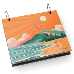 bibfolio bib album with a colorful beach scene design on the cover