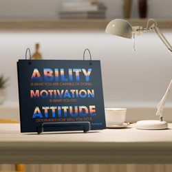 Motivational bibfolio bib album on a desk with a lamp and cup in the background