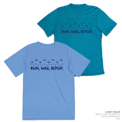 Two t-shirts, one blue and one teal, with 'RUN, WAG, REPEAT.' text on a white background.