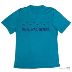 Blue t-shirt with 'RUN, WAG, REPEAT' text on a white background