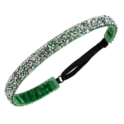 Green headband with rhinestone embellishments on a white background