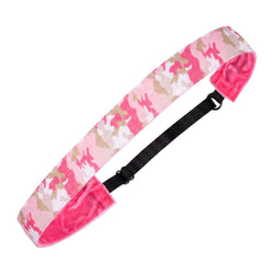 Pink camouflage headband with a black strap on a white background