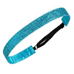 Turquoise glittery headband with black elastic band on a white background
