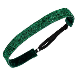 Green glittery headband on a white background