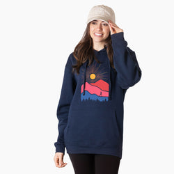 Woman wearing a navy hoodie with a colorful graphic design on a white background