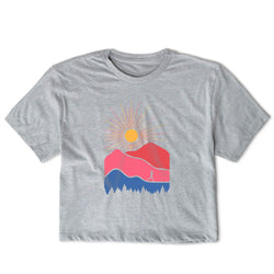 Gray t-shirt with a mountain and sun graphic on a white background