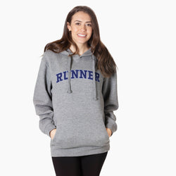 Woman wearing a gray hoodie with 'RUNNER' printed on it against a white background