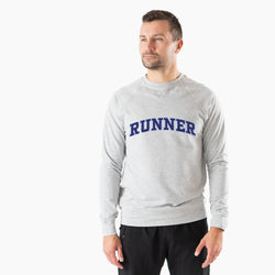 Man wearing a gray sweatshirt with 'RUNNER' printed on it against a white background