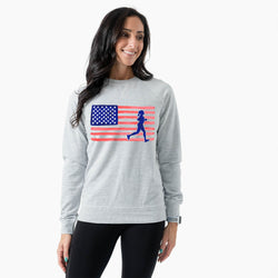 Woman wearing a gray sweatshirt with an American flag and running woman graphic on a white background