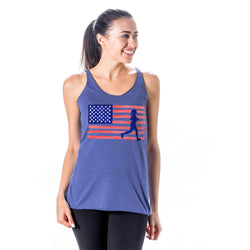 Woman wearing a blue tank top with an American flag and running figure design on a white background