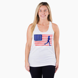 Woman wearing a white tank top with an American flag and running woman graphic on a white background