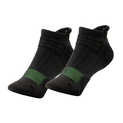 Pair of black ankle socks with green accents on a white background