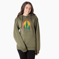 Woman wearing a green hoodie with a nature happy hour graphic and text on a white background