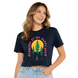 Woman wearing a navy blue t-shirt with 'Running is my happy hour' graphic design on a white background